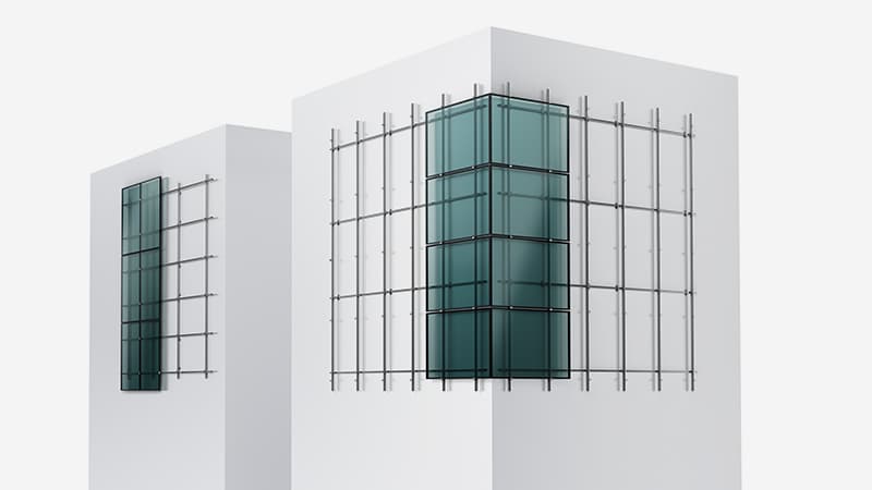 Two white buildings with metal frameworks on the exterior, each with glass panels forming a protruding rectangular structure in the center.