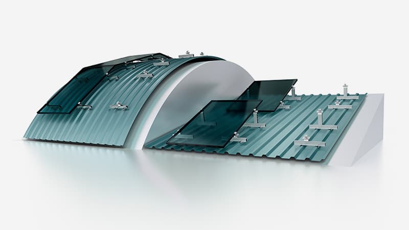 A model of a curved metal roof with solar panels attached to its surface in an angled arrangement. The roof and panels are shown on a minimalist white background.
