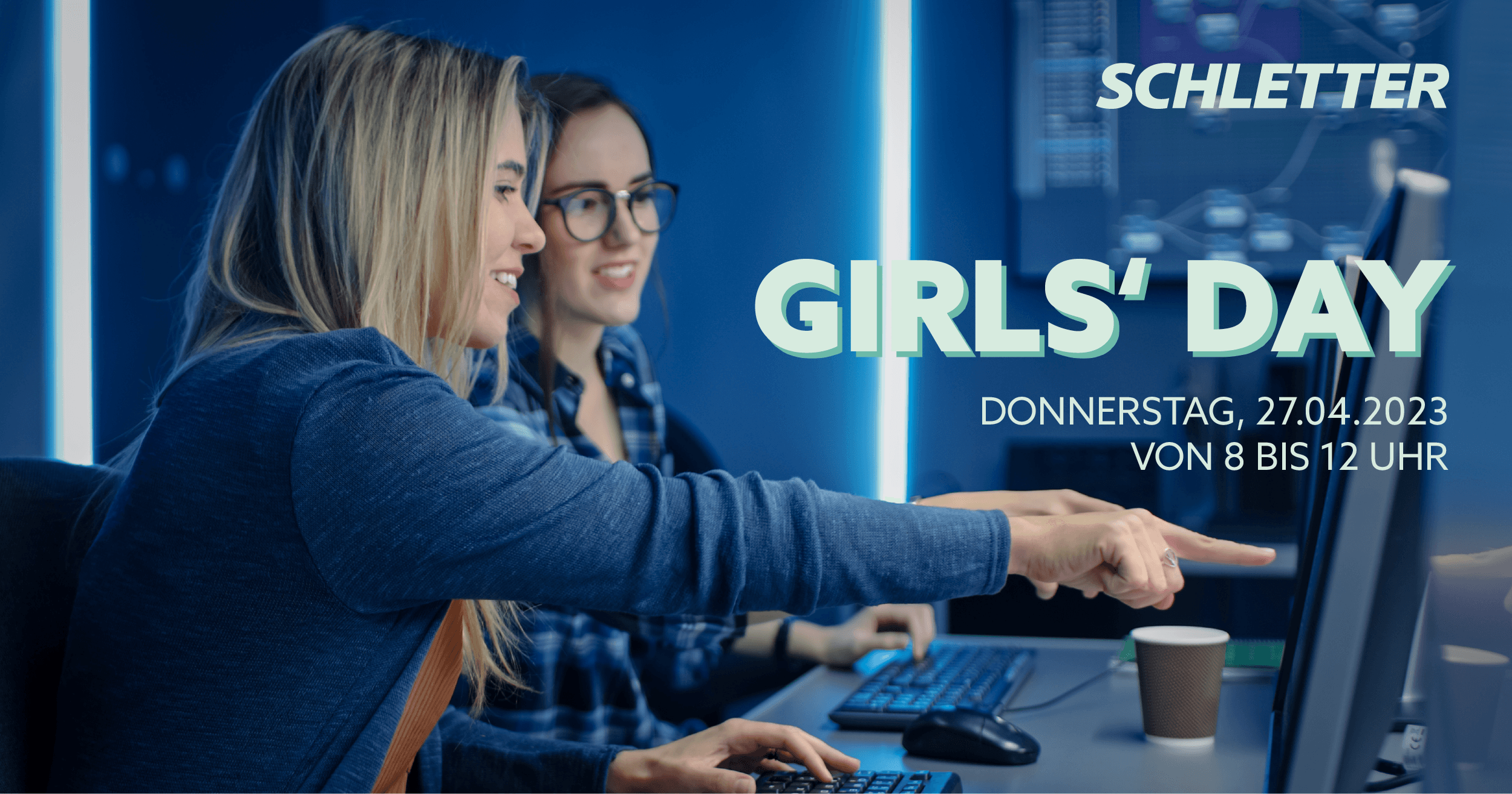 Two women are seated at computer workstations in a tech environment, one pointing at the screen. Text on the image reads: "Schletter Girls' Day, Donnerstag, 27.04.2023, von 8 bis 12 Uhr.