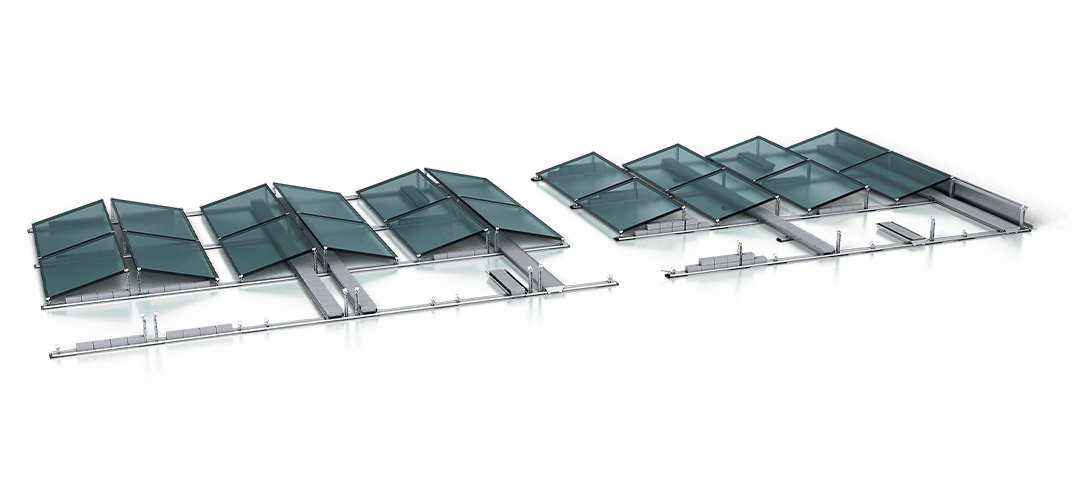 Aerial view of a fish farming facility with multiple large, rectangular tanks arranged in rows on a water surface. The tanks are connected by pathways and equipment.